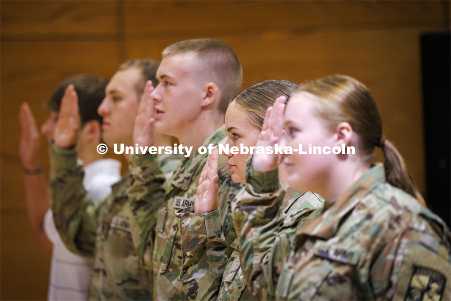 ROTC cadet Jocelyn Cheek recites the oath given by Lt. Col. Mark Peer at the contracting ceremony. The ceremony concludes the contracting event, so they are now receiving their full scholarship benefits. August 19, 2022. Photo by Craig Chandler / University Communication.