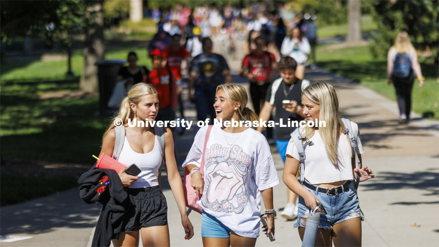 Claire Thornton, Emma Liberta and Maddy Wells walk through the plaza as the three freshmen return from a morning class. First day of classes. August 22, 2022. Photo by Craig Chandler / University Communication.