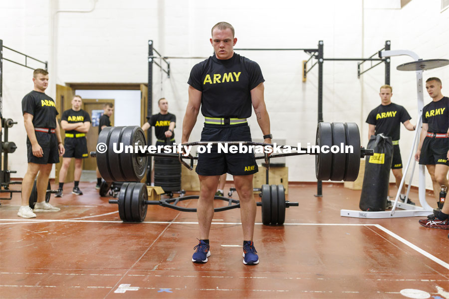 Cadet Brendan Kauth-Fisher lifts 340 pounds as part of the Army Combat Fitness Test. Army ROTC Cadets drill beginning at 6 am on the first day of classes. August 22, 2022. Photo by Craig Chandler / University Communication.