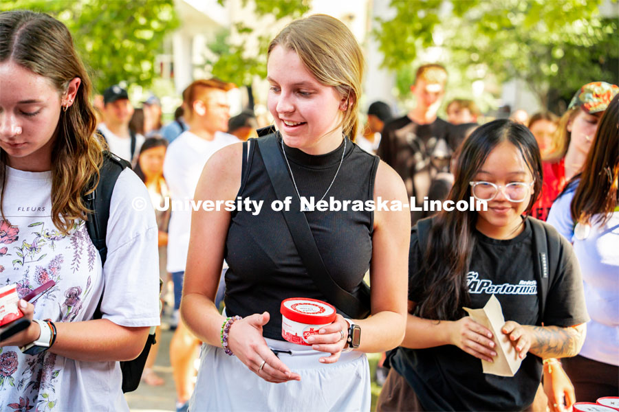Students enjoy some Dairy Store ice cream at the College of Architecture Ice Cream Social outside of Architecture Hall. August 24, 2022. Photo by Jonah Tran/ University Communication