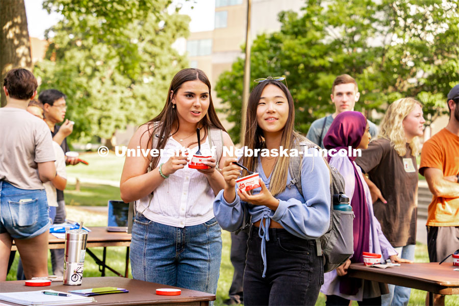 Students enjoy some Dairy Store ice cream at the College of Architecture Ice Cream Social outside of Architecture Hall. August 24, 2022. Photo by Jonah Tran/ University Communication