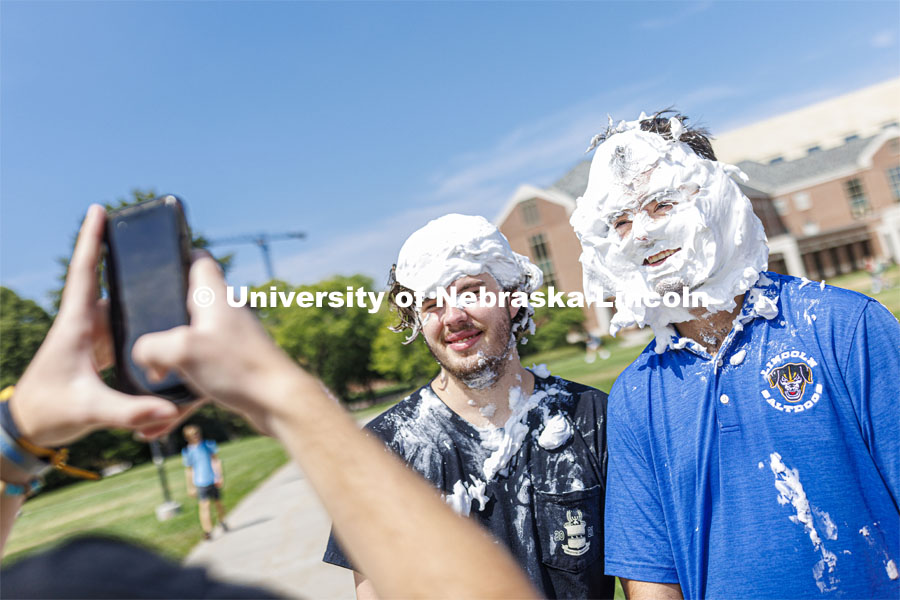 Acacia fraternity held a pie-in-the-face fundraiser for Bryan Health’s new cancer center. All the UNL fraternities are participating and have raised more than $200,000 so far this year. August 25, 2022. Photo by Craig Chandler / University Communication.