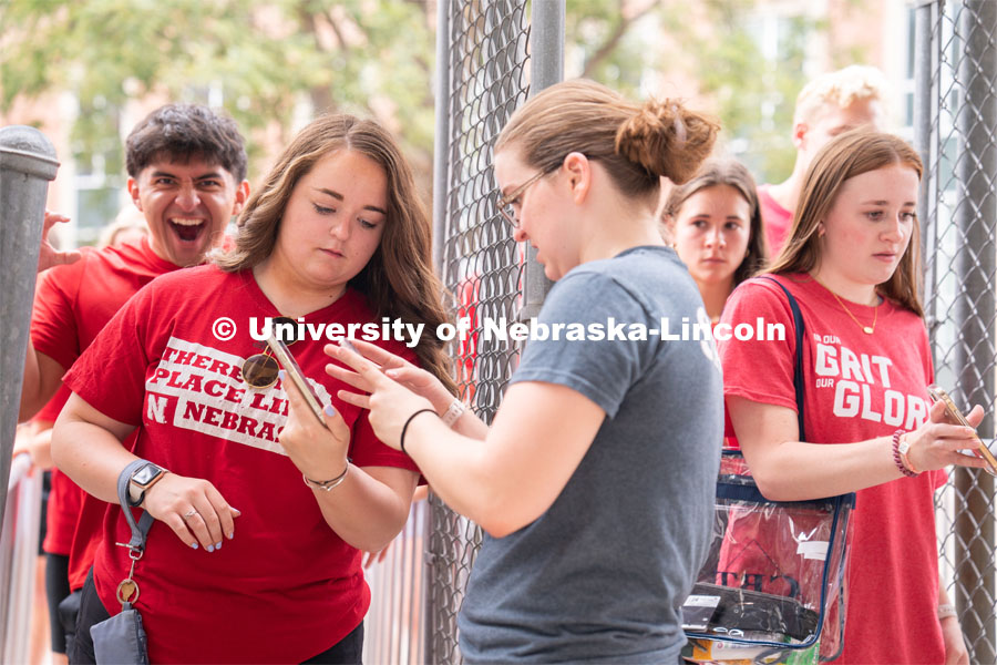 Husker fans are lined up and scanning their tickets to get in to the Nebraska vs Northwestern football watch party in Memorial Stadium. August 27, 2022. Photo by Jordan Opp for University Communication.