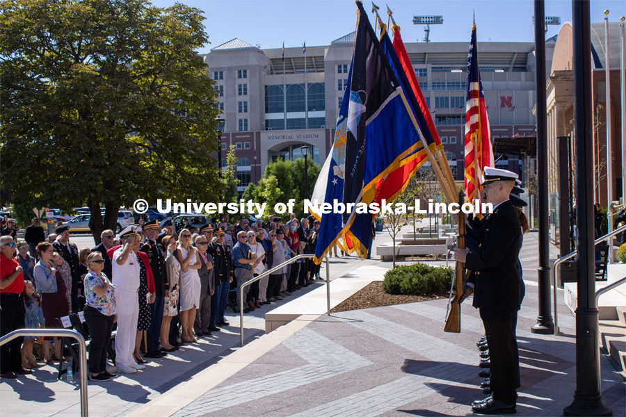 A color guard presents the flags during the dedication of the new Veterans Tribute. Veteran's Memorial Ceremony. Dedication of Veterans’ Tribute project outside Military and Naval Science building. September 11, 2022. Photo by Gus Kathol for University Communication.