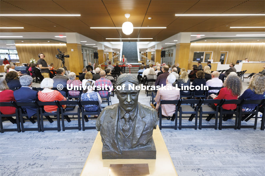 The bust of Roscoe Pound, Dean of the Law College from 1903-07 oversees the library and the celebration. Ribbon cutting for the renovation of the Schmid Law Library at the College of Law. September 16, 2022. Photo by Craig Chandler / University Communication.