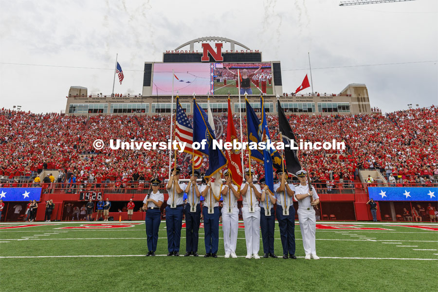 The ROTC Colorguard stand at attention on the field for the National Anthem. Nebraska vs Oklahoma University football in Memorial Stadium. September 17, 2022. Photo by Craig Chandler / University Communication.