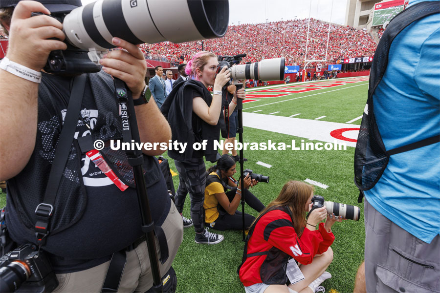 Student photographers on the field at the Nebraska vs Oklahoma University football in Memorial Stadium. September 17, 2022. Photo by Craig Chandler / University Communication.