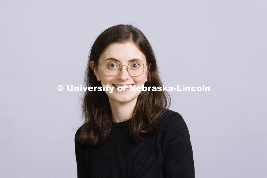 Studio portrait of Emma Gregoline, lectuer, graphic design at the School of Art and Art History. New Faculty and Staff. September 22, 2022. Photo by Craig Chandler / University Communication.