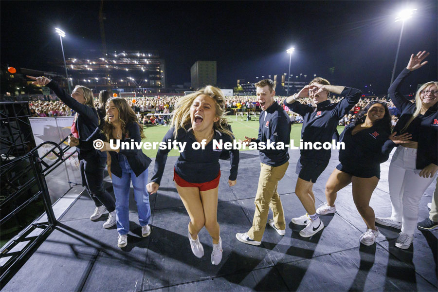 Aleksandra Glowik and other Homecoming Royalty react to cheering from their friends who were waiting to perform on stage. Showtime at the Vine Street Fields. Recognized Student Organizations, Greeks and Residence Halls battle against each other with performances for Homecoming competition points and ultimate bragging rights. Homecoming 2022. September 26, 2022. Photo by Craig Chandler / University Communication.