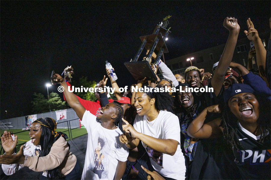 Members of the African People’s Union celebrate their RSO first place trophy on stage at Showtime at the Vine Street Fields. Recognized Student Organizations, Greeks and Residence Halls battle against each other with performances for Homecoming competition points and ultimate bragging rights. Homecoming 2022. September 26, 2022. Photo by Craig Chandler / University Communication.