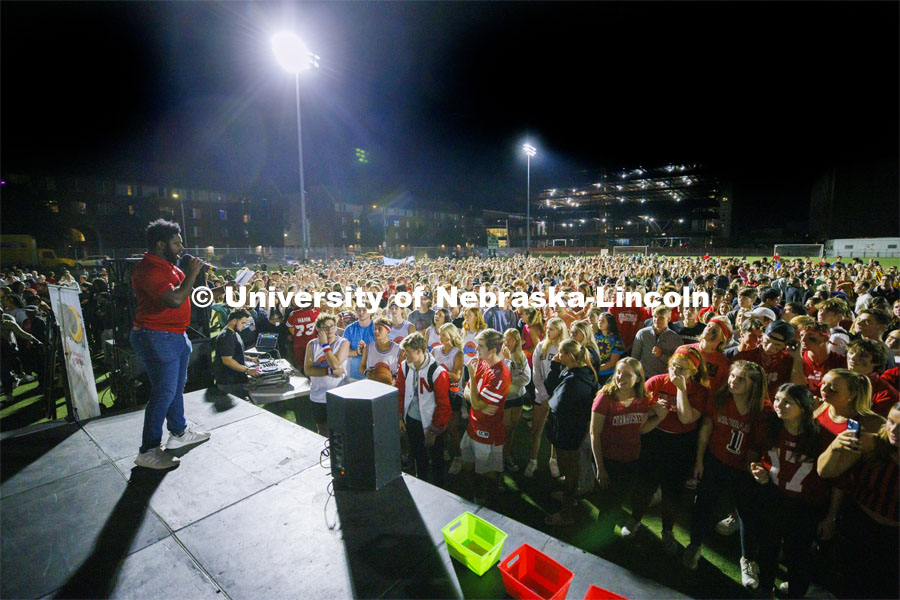 D-Wayne announces the winner to the crowd at Showtime at Vine Street Fields.  Homecoming 2022. Showtime at the Vine Street Fields. Recognized Student Organizations, Greeks and Residence Halls battle against each other with performances for Homecoming competition points and ultimate bragging rights. Homecoming 2022. September 26, 2022. Photo by Craig Chandler / University Communication.