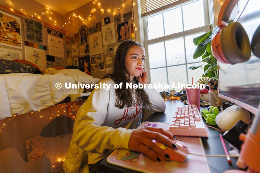 One student studying in their Courtyard Residence Hall room. Housing Photo Shoot in The Courtyards Residence Hall. September 27, 2022. Photo by Craig Chandler / University Communication.