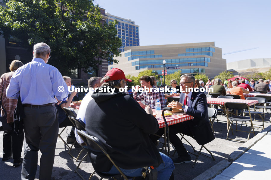 Chancellor Ronnie Green talks with people on R Street attending the all-employee picnic. The picnic followed the Chancellor’s 2022 State of Our University address. September 28, 2022. Photo by Craig Chandler / University Communication.