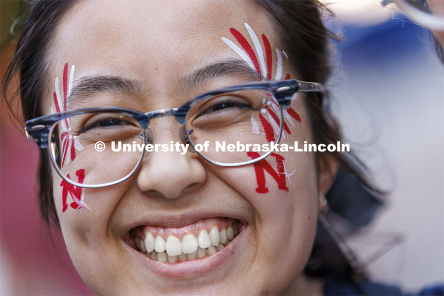 Jenny Nguyen shows off her face-painted spirit. Homecoming Parade and Cornstalk. September 30, 2022. Photo by Craig Chandler / University Communication.