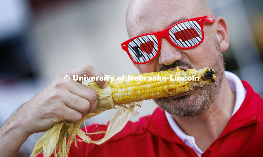 Jeff Sheldon with the Alumni Association shows off his love of Nebraska and corn. Homecoming Parade and Cornstalk. September 30, 2022. Photo by Craig Chandler / University Communication.