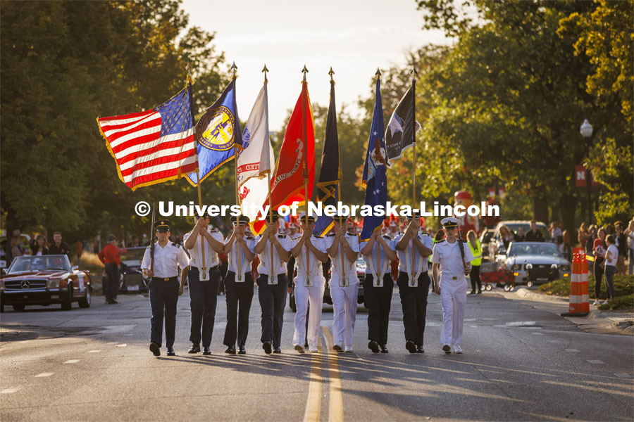 The ROTC color guard marches down R Street. Homecoming Parade and Cornstalk. September 30, 2022. Photo by Craig Chandler / University Communication.