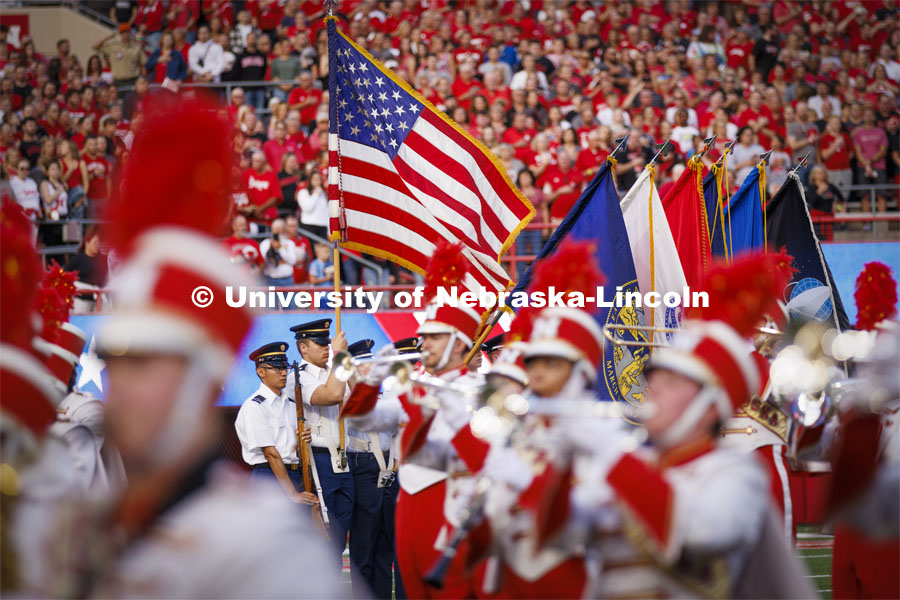 The Cornhusker Marching Band plays as the ROTC Colorguard march in. Nebraska vs. Indiana football Homecoming game. October 1, 2022. Photo by Craig Chandler / University Communication.