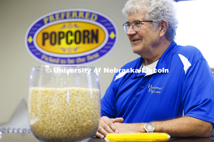 Interviewed in his company office’s conference room, Norm Krug co-founded Preferred Popcorn, wondered whether he would eventually tire of the snack. Nearly 25 years later, “I still love it and consume it every day.” Preferred Popcorn grows popcorn near Chapman, Nebraska and throughout the area. It is headed by Norm Krug. October 13, 2022. Photo by Craig Chandler / University Communication.
