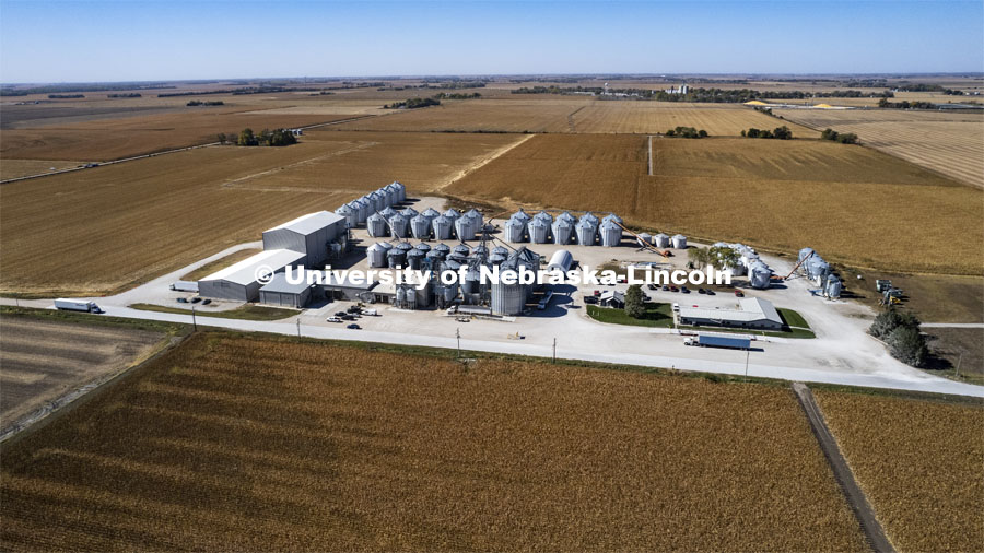 An aerial view of the Preferred Popcorn headquarters east of Chapman, Nebraska, has offices, processing buildings and more than 60 bins for storing their many varieties. Preferred Popcorn grows popcorn near Chapman, Nebraska and throughout the area. It is headed by Norm Krug. October 13, 2022. Photo by Craig Chandler / University Communication.