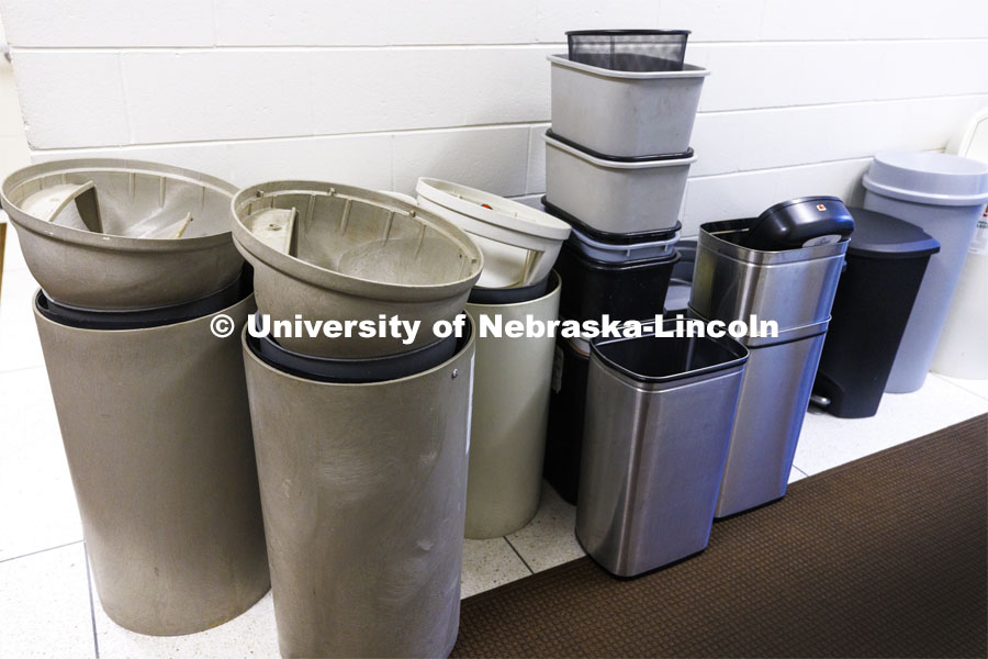 Out with the old: previously used recycling bins are removed to make room for the new recycling stations in the Gwendolyn A. Newkirk Human Sciences Building on East Campus. October 18, 2022. Photo by Craig Chandler / University Communication.