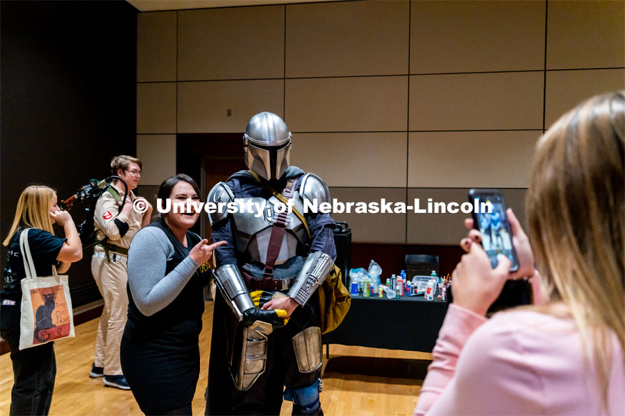 Students pose with Ben Ferguson dressed up as the Mandalorian at the Husker Haunt in the Nebraska East Union. October 20, 2022. Photo by Jonah Tran/ University Communication.