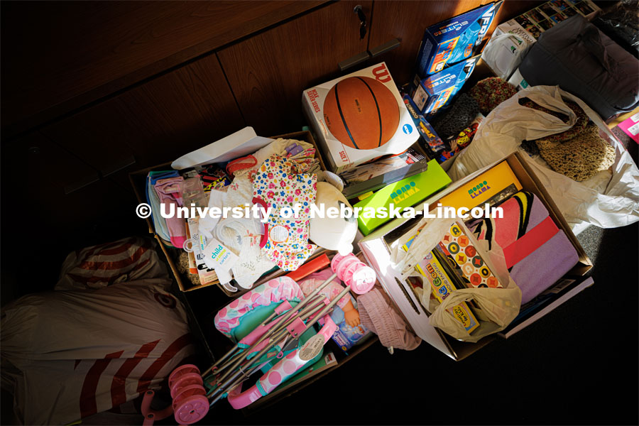 Holiday for Little Huskers gifts in the Women's Center’s conference room. November 23, 2022. Photo by Craig Chandler / University Communication.