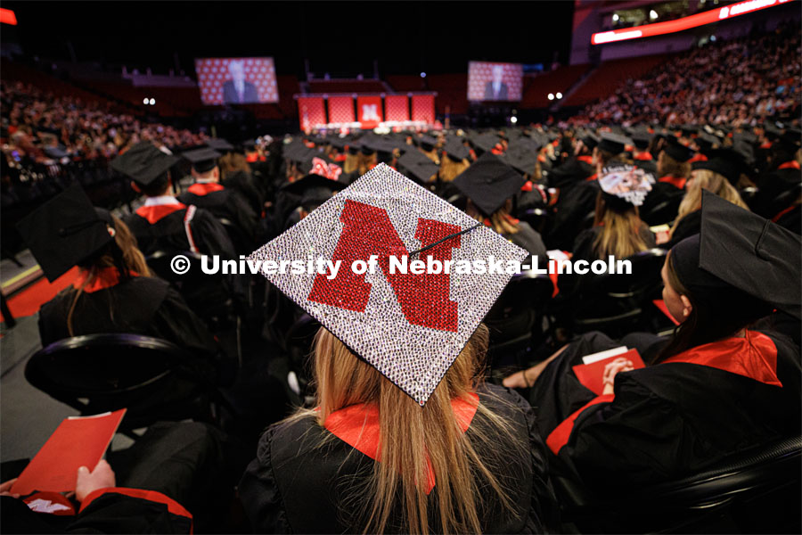 Valerie Powers’ decorated mortar board sparkles under the arena lights. Winter Undergraduate Commencement in Pinnacle Bank Arena. December 17, 2022. Photo by Craig Chandler / University Communication.