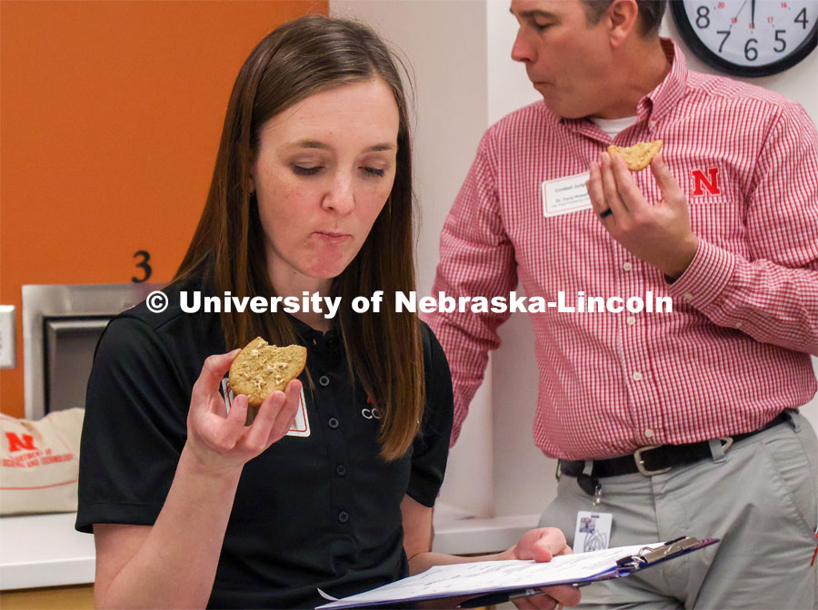 Contest judges Nicole Kallhoff with ConAgra Brands and Terry Howell with the UNL Food Processing Center taste contest entries. Groups prepared baked goods using flour made from crickets. Battle of the Food Scientists at Nebraska Innovation Campus. February 15, 2023. Photo by Blaney Dreifurst / University Communication.
