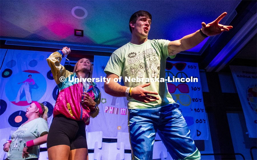 Addy Timmerman and Luke Woosley sing to the crowd during Huskerthon 2023. University of Nebraska–Lincoln students raised $118,208 during the annual HuskerThon on Feb. 25. Also known as Dance Marathon, the event is part of a nationwide fundraiser supporting Children’s Miracle Network Hospitals. The annual event, which launched in 2006, is the largest student philanthropic event on campus. The mission of the event encourages participants to, “dance for those who can’t.” All funds collected by the Huskers benefit the Children’s Hospital and Medical Center in Omaha. February 25, 2023. Photo by Blaney Dreifurst for University Communication.