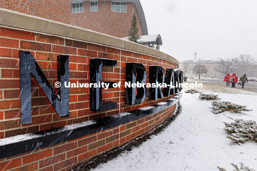 The Nebraska sign in front of the Van Brundt Visitor's Center is surrounded by snow. Spring Break snowstorm, City Campus. March 16, 2023. Photo by Craig Chandler / University Communication.