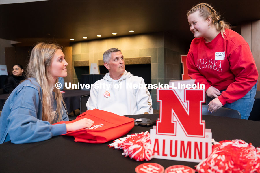 University of Nebraska student representatives speak with out-of-state students and their families during student admission’s National Tailgate at the Wick Alumni Center. Admitted Student Day is UNL’s in-person, on-campus event for all admitted students. March 24, 2023. Photo by Jordan Opp for University Communication.