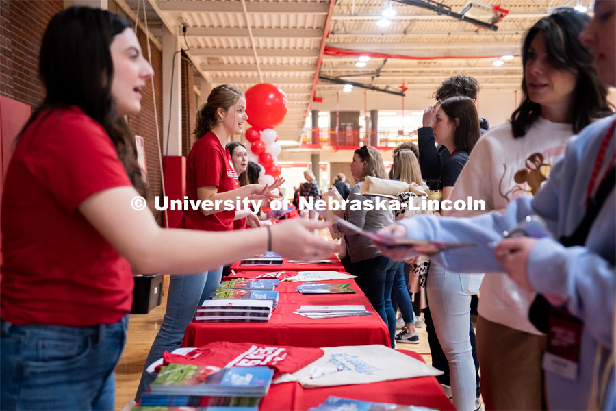 New students receive their name tags and information packets during Admitted Student Day. Admitted Student Day is UNL’s in-person, on-campus event for all admitted students. March 24, 2023. Photo by Jordan Opp for University Communication.