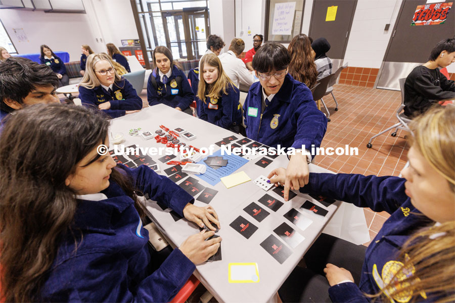 FFA students play a card game during the event. FFA pen pals from urban and rural schools meet face-to-face during the FFA state convention. March 29, 2023. Photo by Craig Chandler / University Communication.