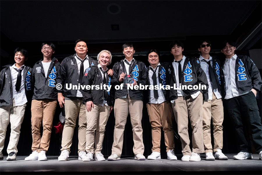 Members of Lambda Phi Epsilon pose for a photo after winning the OASIS and FRATERNITY AND SORORITY LIFE Stroll Off inside the Nebraska Union Centennial Room. April 1, 2023. Photo by Jordan Opp for University Communication.