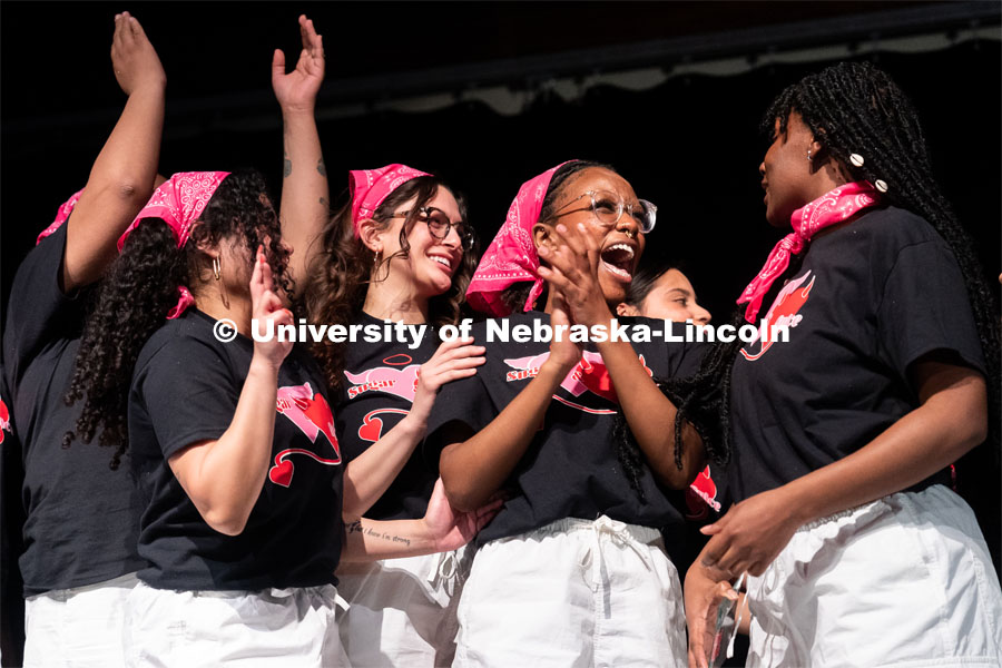 Members of Delta Xi Nu celebrate after winning the OASIS and FRATERNITY AND SORORITY LIFE Stroll Off inside the Nebraska Union Centennial Room. April 1, 2023. Photo by Jordan Opp for University Communication.