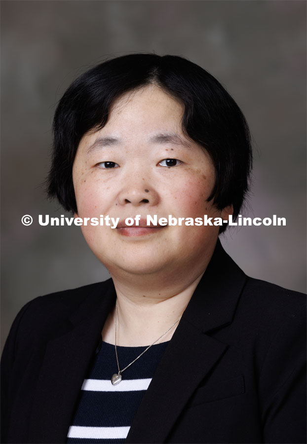 Studio portrait of Wen Qian, Research Assistant Professor in Mechanical and Materials Engineering. April 6, 2023. Photo by Craig Chandler / University Communication.