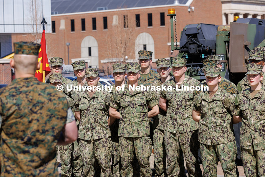 Newly promoted First Sergeant Joshua Glotzbecker talks to the Navy and Marine ROTC cadets after his promotion ceremony. Glotzbecker was responsible for leading all the ROTC Color Guard Ceremonies at Graduation, Football games, Basketball games and all other requests for Color Guard support. He will be departing UNL this summer for another assignment. April 6, 2023. Photo by Craig Chandler / University Communication.