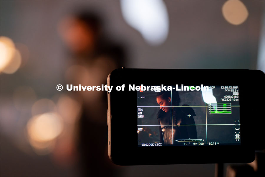 Freshman acting major Sydney Kwasa is shown on the screen of a camera during filming of a final project at the Johnny Carson Center for Emerging Media Arts. Behind Kwasa is an environment made in Unreal Engine. April 9, 2023. Photo by Jordan Opp for University Communication.
