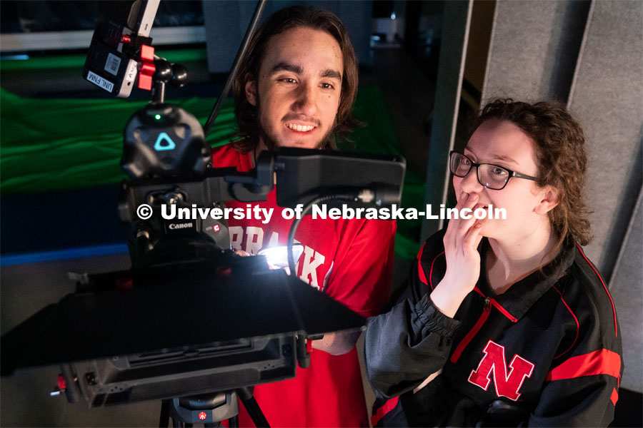Sophomore emerging media arts majors Isaiah Griffith, left, and Marley Hewitt review footage on a camera during filming of Griffith’s final project at the Johnny Carson Center for Emerging Media Arts. April 9, 2023. Photo by Jordan Opp for University Communication.
