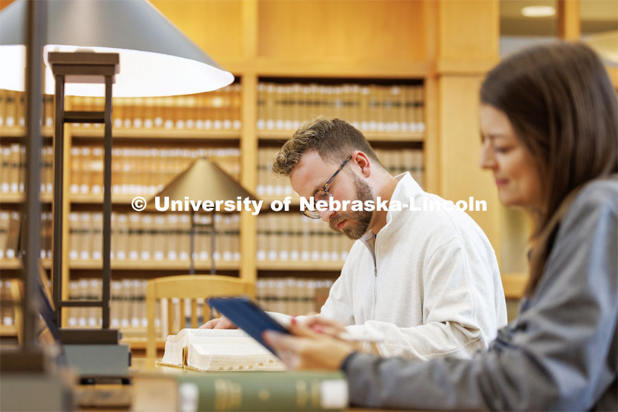 Students studying in the Law Library. College of Law photo shoot. April 28, 2023. Photo by Craig Chandler / University Communication.