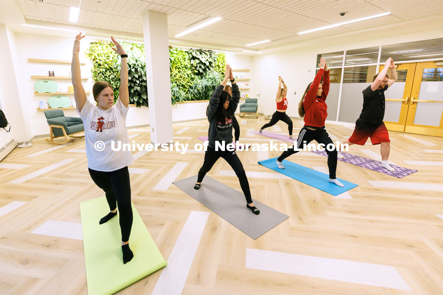 Students practicing yoga. College of Law photo shoot. April 28, 2023. Photo by Craig Chandler / University Communication.
