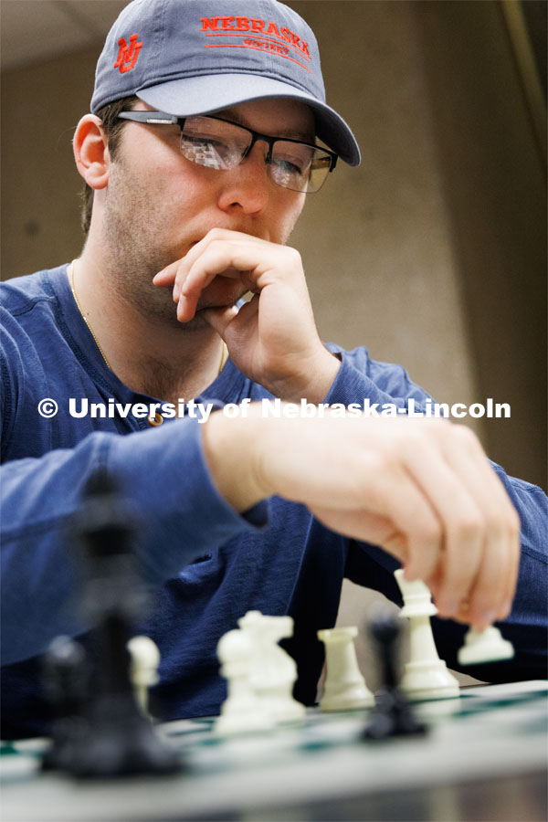 Students playing chess. College of Law photo shoot. April 28, 2023. Photo by Craig Chandler / University Communication.