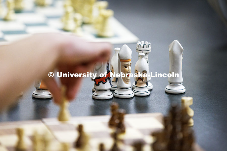 Students playing chess. College of Law photo shoot. April 28, 2023. Photo by Craig Chandler / University Communication.