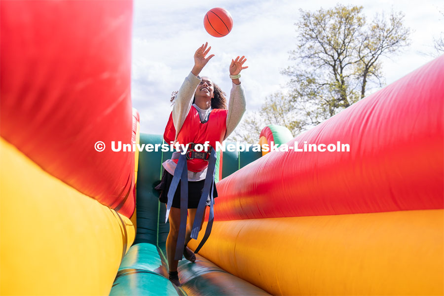 Sophomore Biochemical Pre-Vet major Yasmin Worth shoots a ball at the 2023 End of Year Bash at East Campus Mall. April 29, 2023. Photo by Jordan Opp for University Communication.