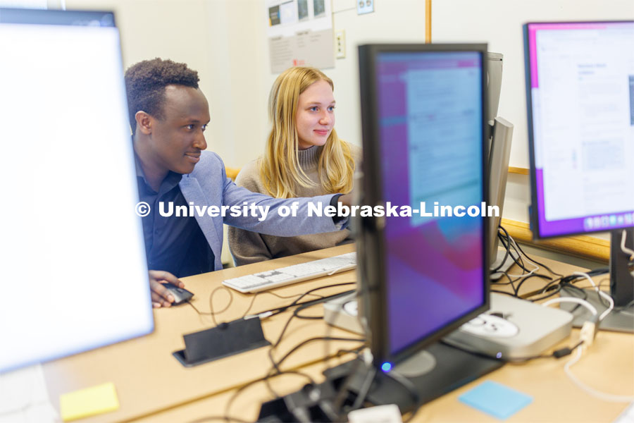 Design Studio team members Samuel Rangira, Sophie Hellebusch look over their project. May 2, 2023. Photo by Craig Chandler / University Communication.