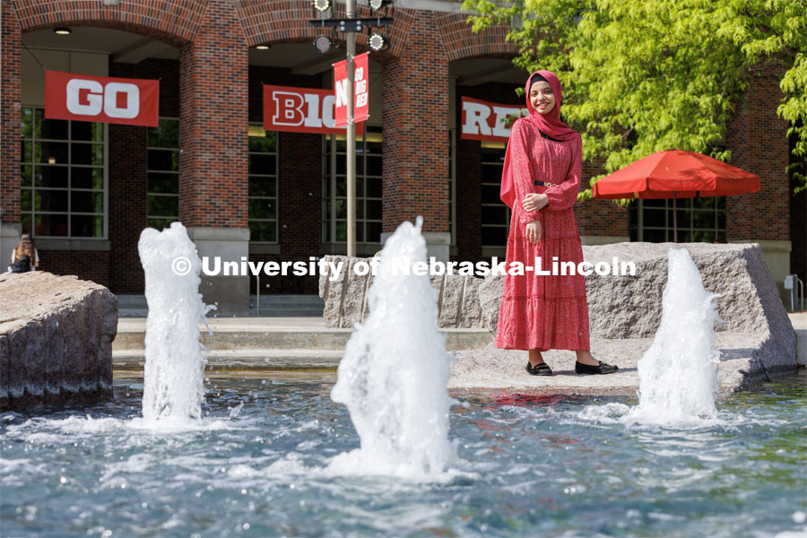 Sukaina Al-Hamedi, Husker Dialogue speaker is photographed outside the Nebraska Union by the Broyhill Fountain. May 10, 2023. Photo by Craig Chandler / University Communication.