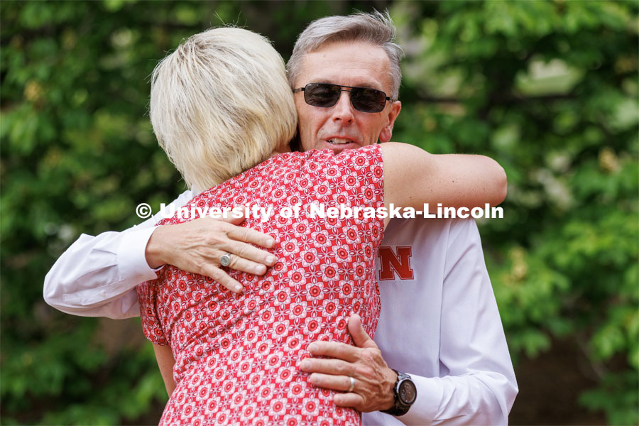 Ronnie Green is hugged by Lisa Kaslon, an extension educator with Nebraska Extension, during the May 11 event. Ronnie and Jane Green had an open house Thursday at the Maxwell Arboretum on East Campus. May 11, 2023. Photo by Craig Chandler / University Communication.