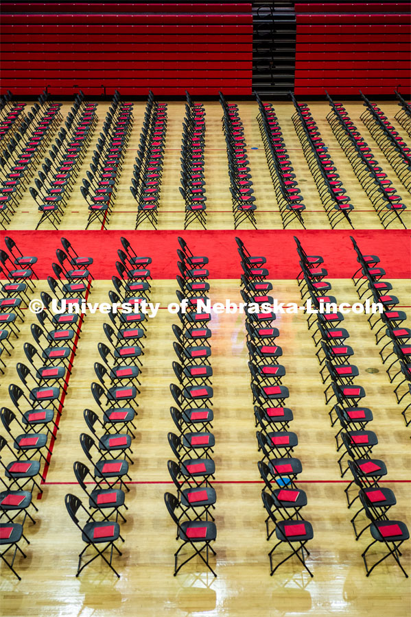 Empty chairs await grad students at the 2023 Spring Graduate Commencement in Bob Devaney Sports Center. May 19, 2023. Photo by Justin Mohling for University Communication.