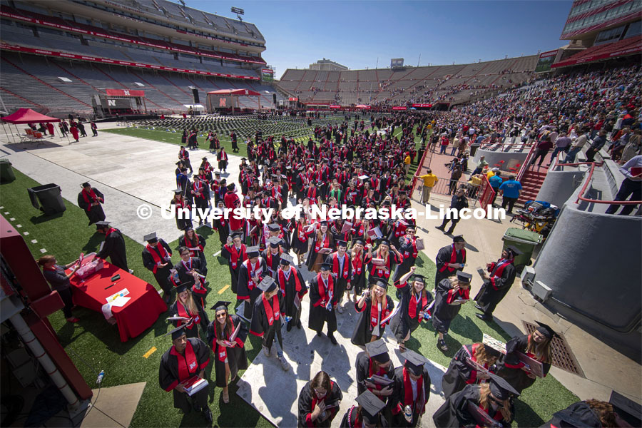 New Husker graduates leave Memorial Stadium. Undergraduate commencement at Memorial Stadium. May 20, 2023. Photo by Dillon Galloway for University Communications.