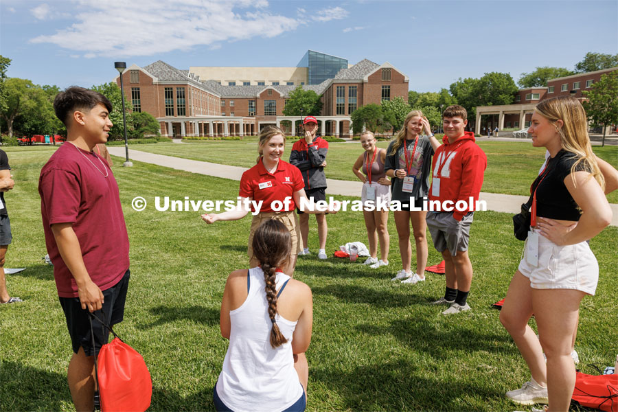 Brecken Obermueller leads her Incoming Huskers in an ice breaker where two students have to out yell the other student. May 31, 2023. Photo by Craig Chandler / University Communication.
